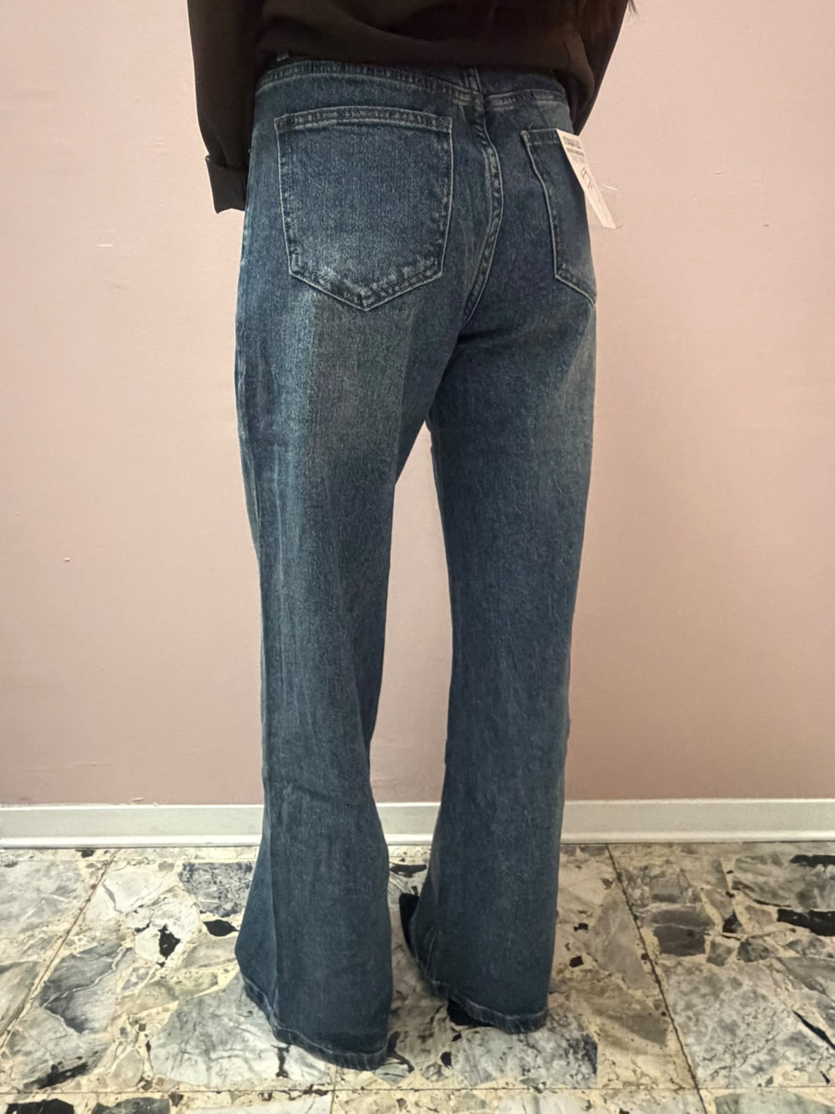 Wide leg con abbottonatura asimmetrica