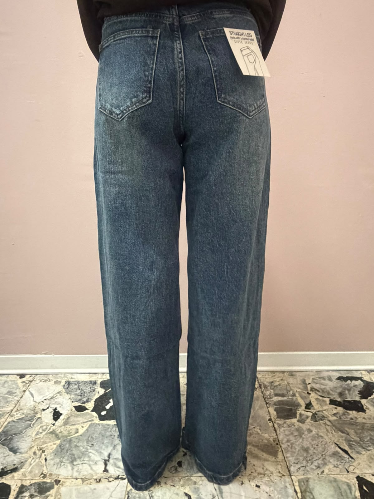 Wide leg con abbottonatura asimmetrica